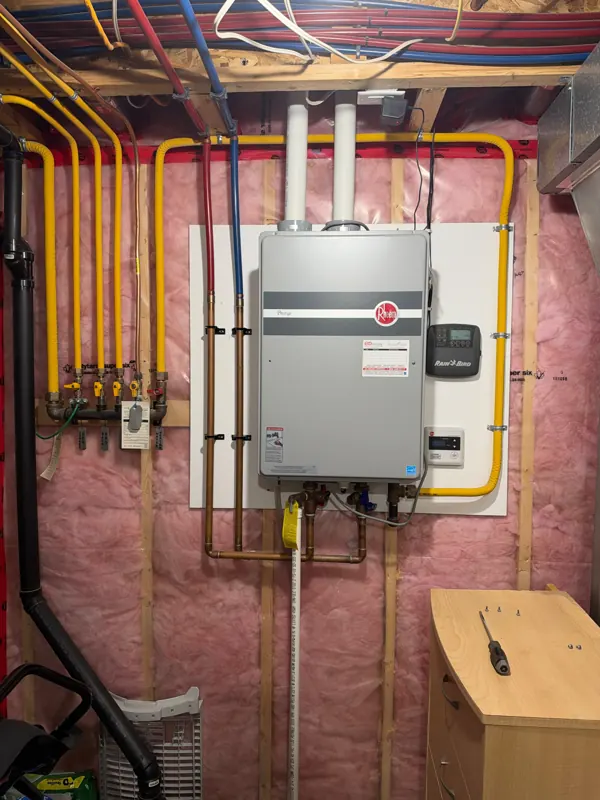 Tankless water heater with new gas lines and venting