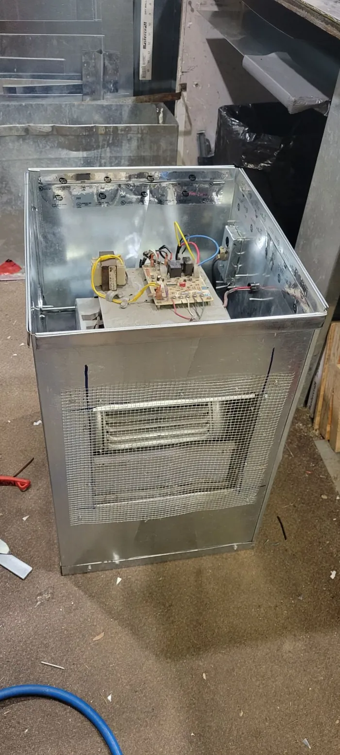 Custom galvanized box fitting on the shop floor