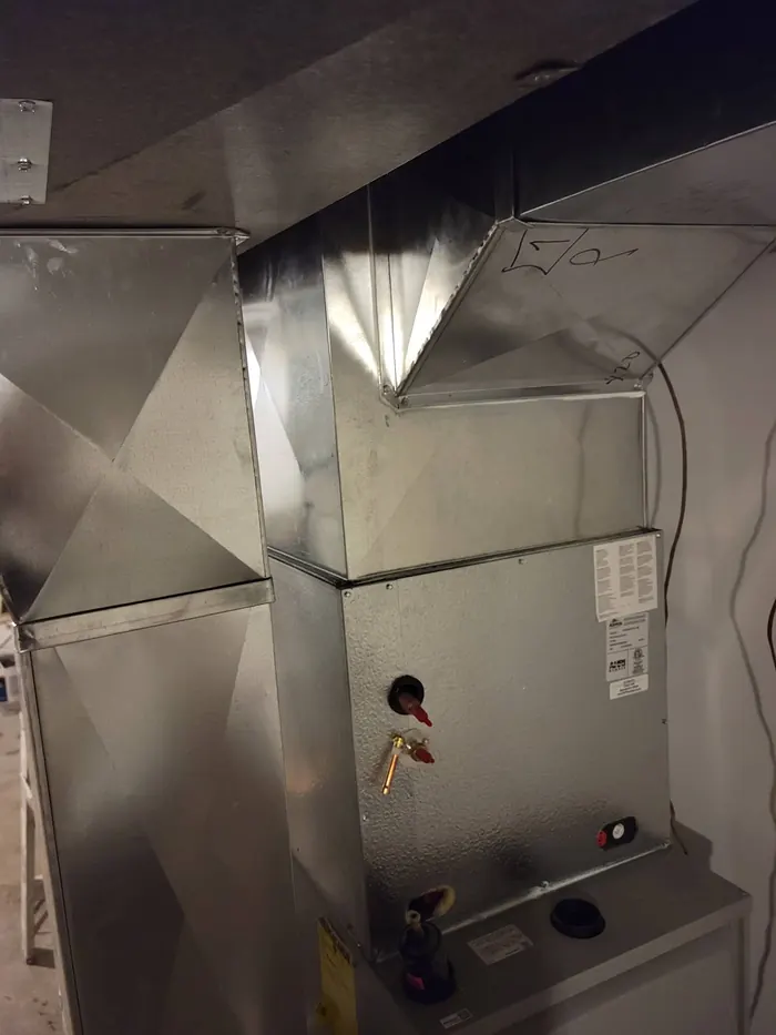 Galvanized plenum fabricated for an air handler