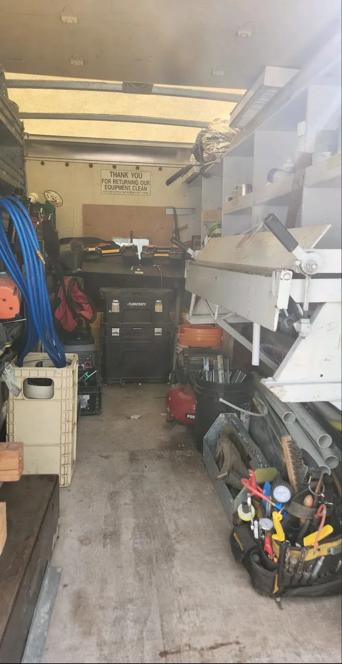MDMC work truck loaded with tools and metal
